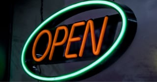 Close up of a lit open sign