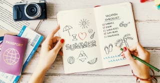 Open page of a travel journal that reads "I Heart Summer"