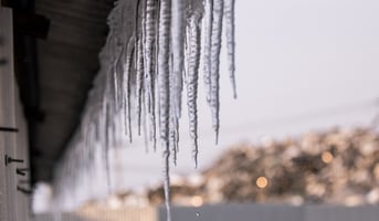 icicles hanging from the eaves
