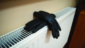 gloves left to dry on a heating vent creating a fire hazard