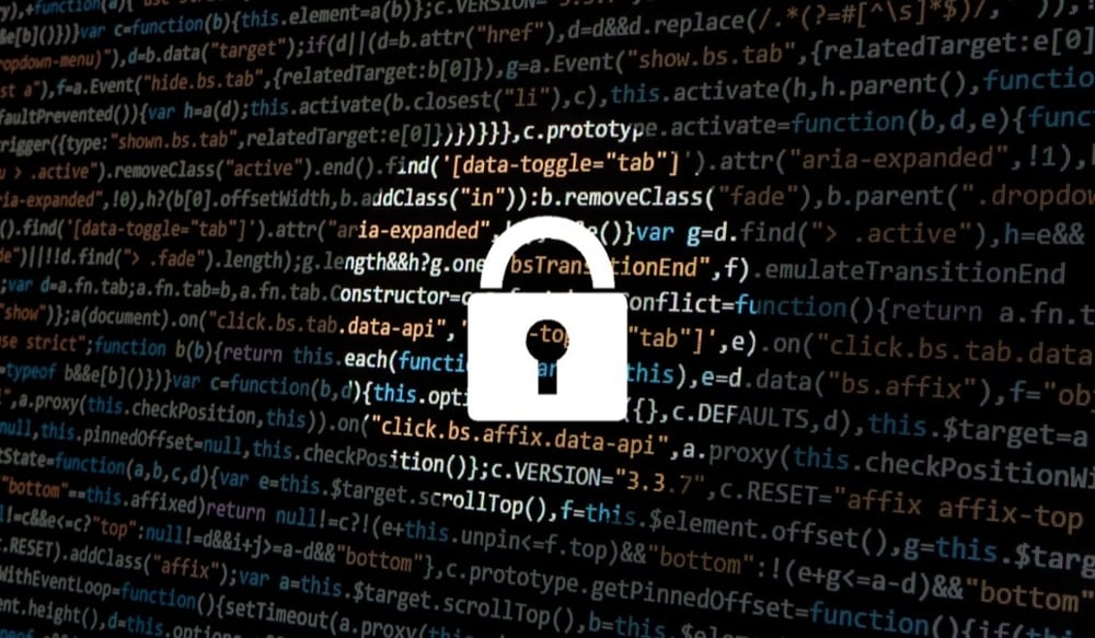 image of a lock over a screen filled with code